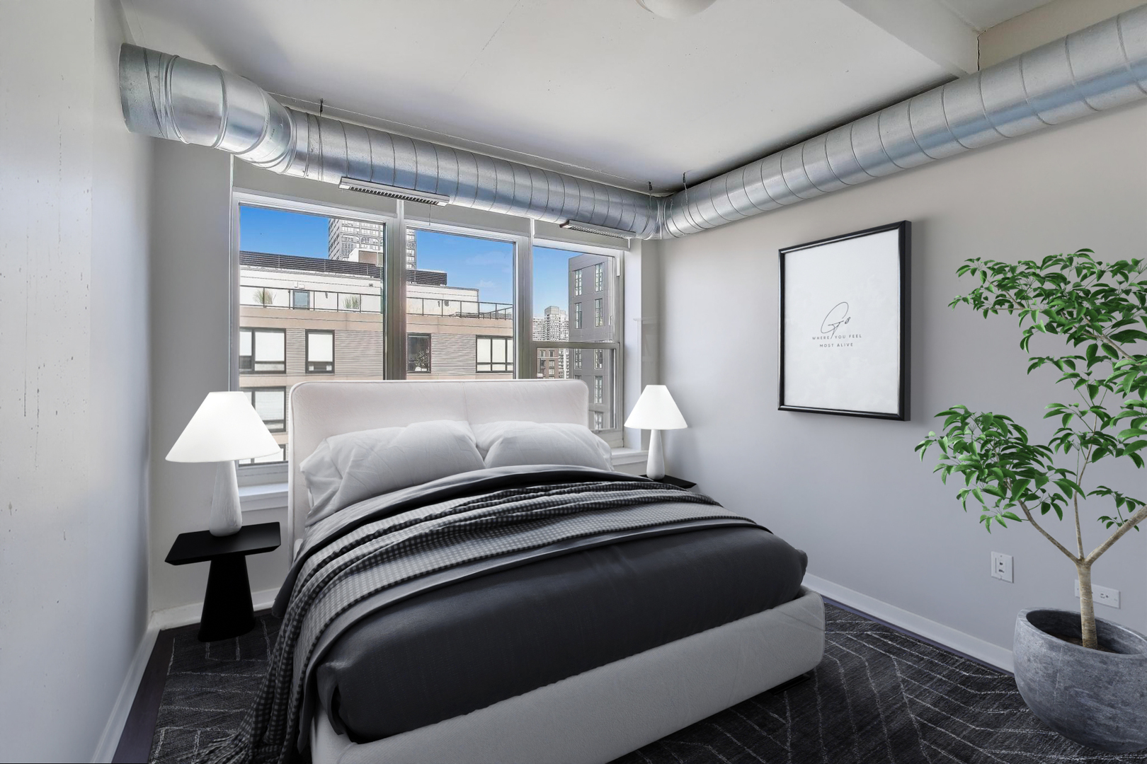 909 West Washington Boulevard, Unit 908 Chicago, IL 60607 - Photo 17 of 26 a bedroom with a bed and a potted plant