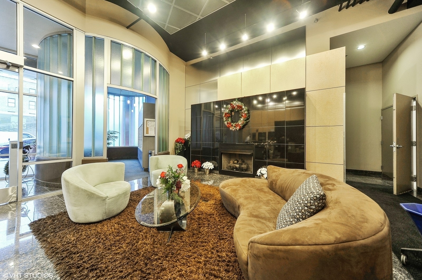 909 West Washington Boulevard, Unit 908 Chicago, IL 60607 - Photo 25 of 26 a living room with furniture and a flat screen tv