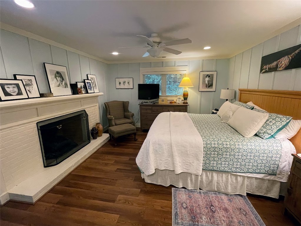 103 Poole Lane Clemson, SC 29631 - Photo 16 of 48 This cozy bedroom features a classic brick fireplace with gas logs perfect for those cold winter nights or creating a comfortable ambiance.