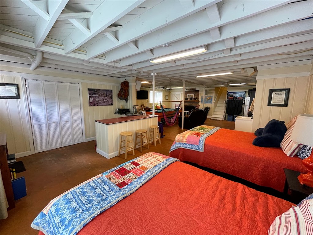 103 Poole Lane Clemson, SC 29631 - Photo 32 of 48 This versatile basement space offers both comfort and recreation with a cozy sleeping area and entertainment zone.