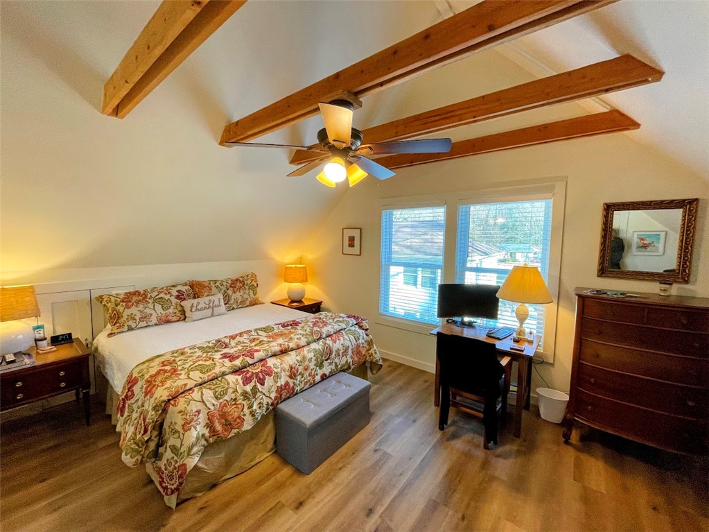 103 Poole Lane Clemson, SC 29631 - Photo 40 of 48 This spacious bedroom features exposed wooden beams and plenty of room for king sized bed and other furniture.