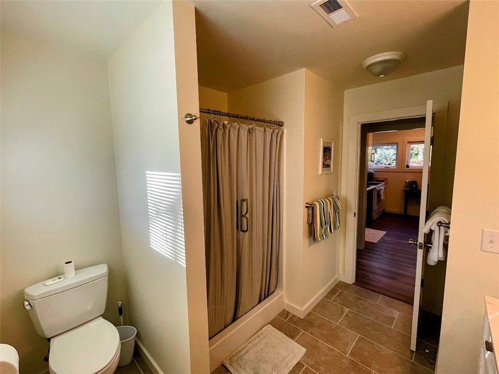 103 Poole Lane Clemson, SC 29631 - Photo 42 of 48 This clean and functional bathroom features tiled flooring and a walk-in shower area.