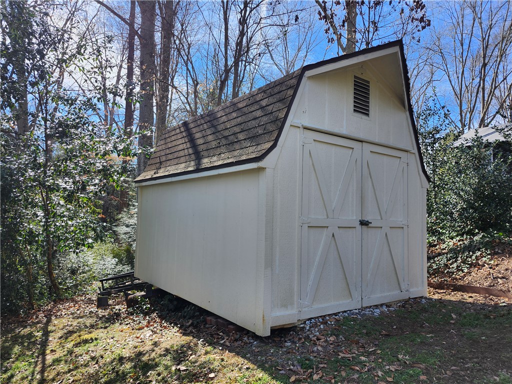 103 Poole Lane Clemson, SC 29631 - Photo 47 of 48 This charming backyard shed provides practical outdoor storage solutions.