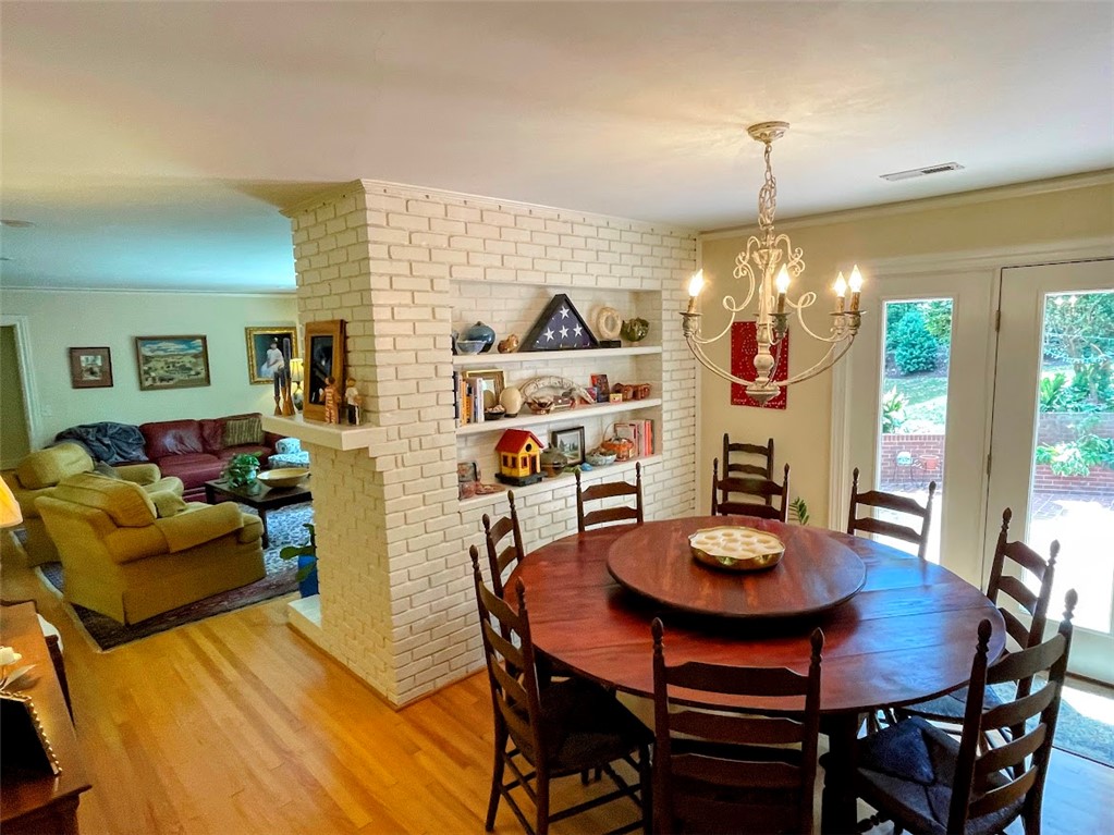 103 Poole Lane Clemson, SC 29631 - Photo 6 of 48 This inviting dining area seamlessly connects to the living space and outdoor access.