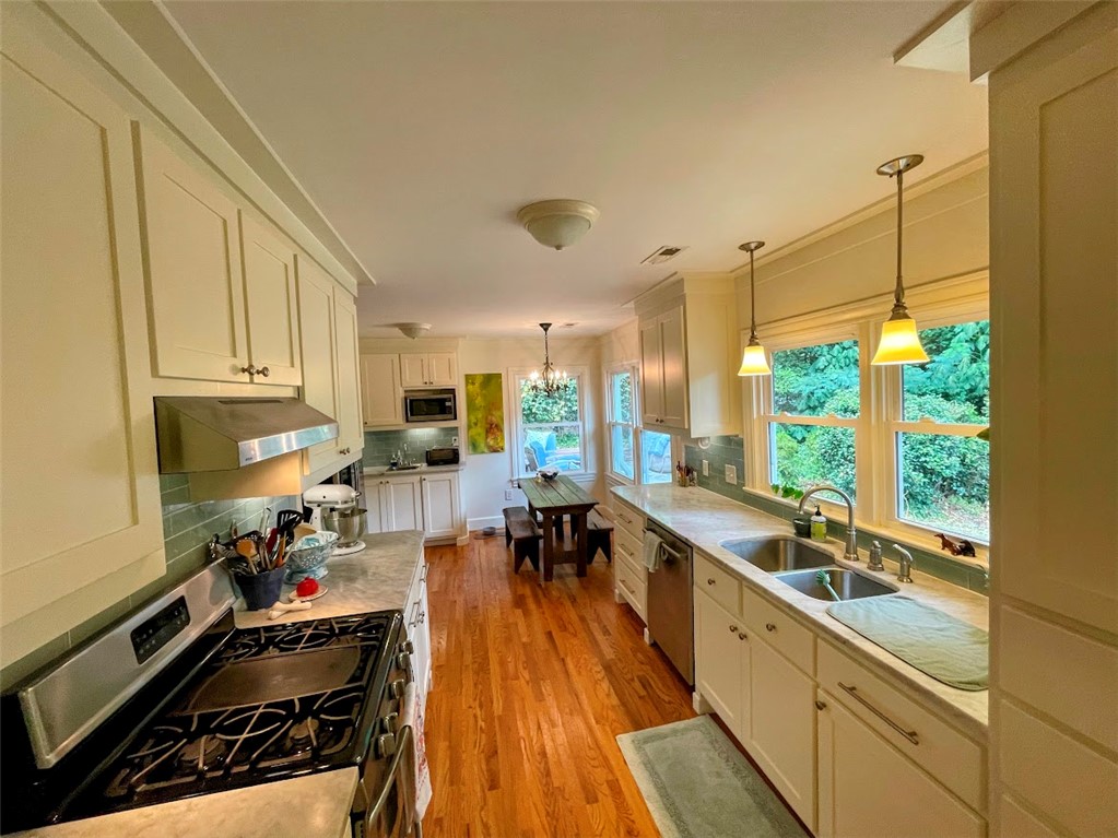 103 Poole Lane Clemson, SC 29631 - Photo 9 of 48 Bright and airy, this culinary space features Carrara Marble counter tops and stainless steel appliances.