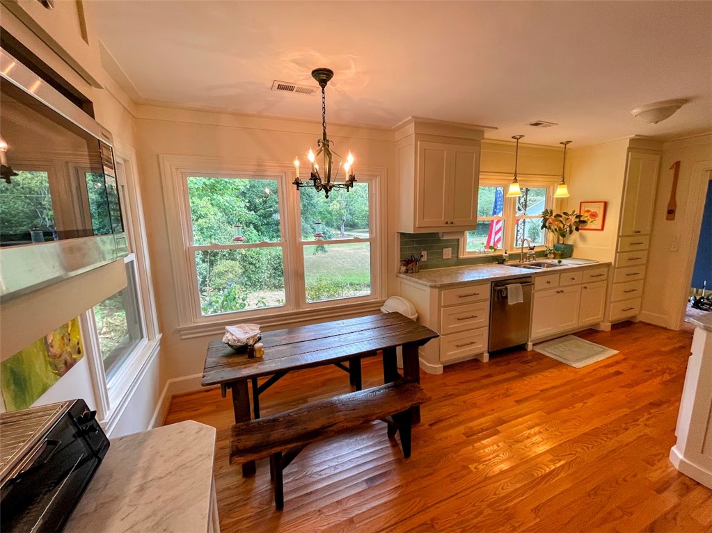 103 Poole Lane Clemson, SC 29631 - Photo 10 of 48 Bright and inviting kitchen with ample natural light and dining space.