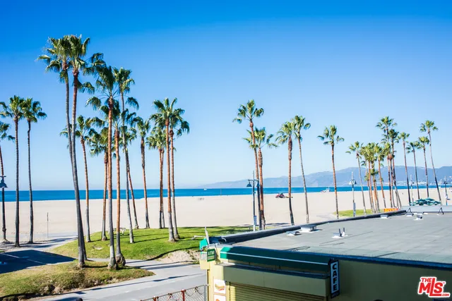 a view of a swimming pool with a lounge chair
