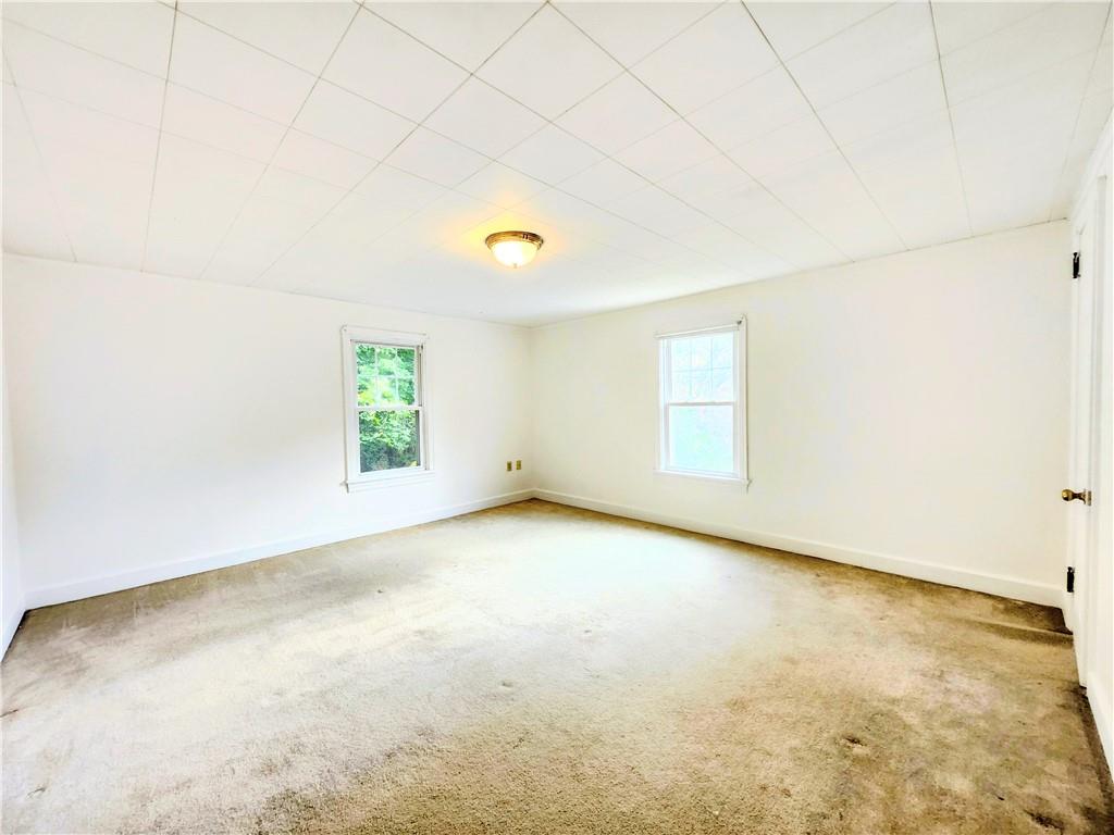 499 White School Road Greensburg, PA 15601 - Photo 15 of 38 an empty room with windows