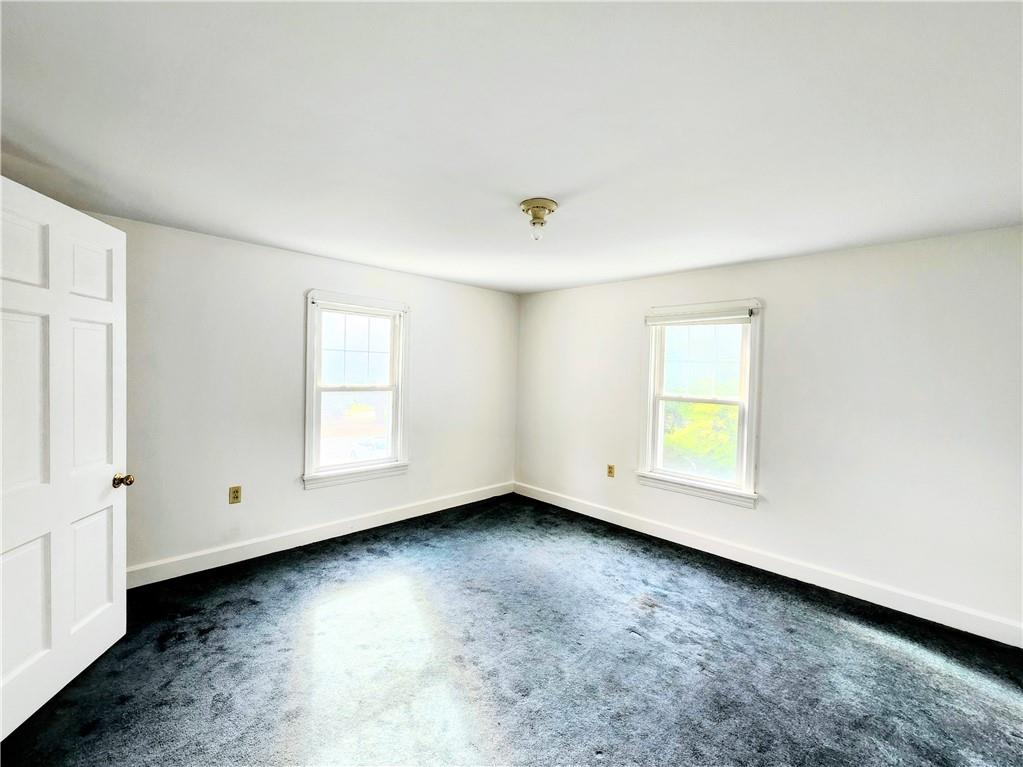 499 White School Road Greensburg, PA 15601 - Photo 17 of 38 an empty room with a window
