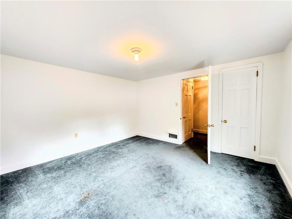 499 White School Road Greensburg, PA 15601 - Photo 18 of 38 an empty room with a natural light