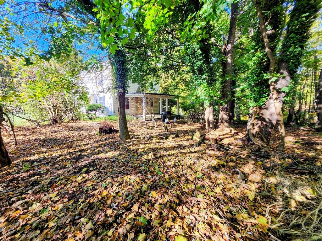 499 White School Road Greensburg, PA 15601 - Photo 33 of 38 a backyard of a house with table and chairs