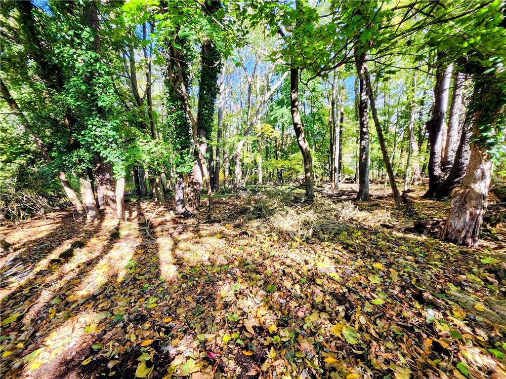 499 White School Road Greensburg, PA 15601 - Photo 34 of 38 a view of outdoor space with deck and trees