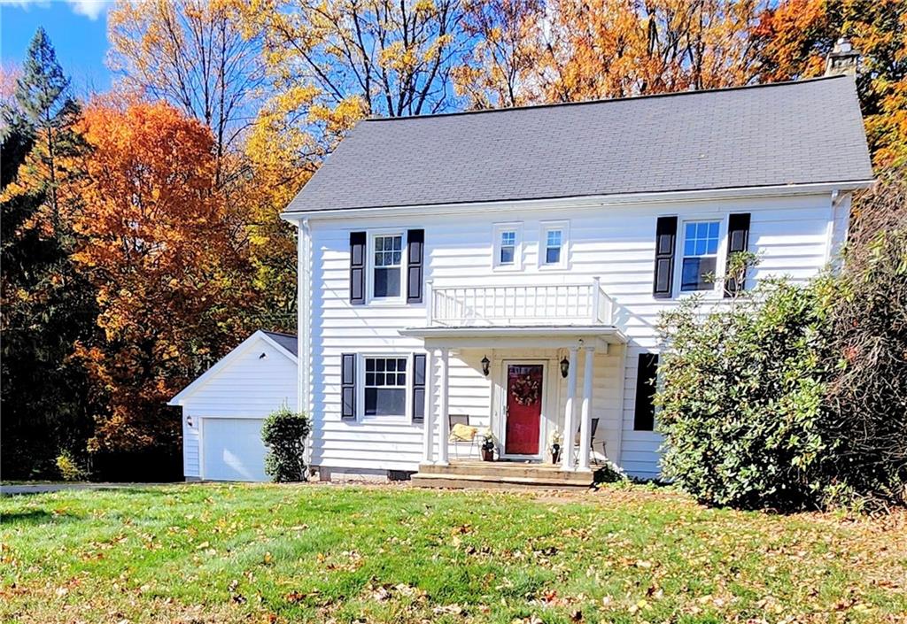 499 White School Road Greensburg, PA 15601 - Photo 38 of 38 a front view of a house with a yard and garage