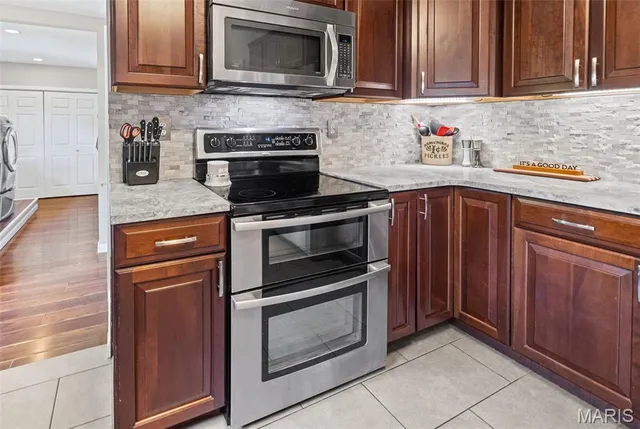 $303,000 | 4918 Chateau Drive, Godfrey, IL 62035