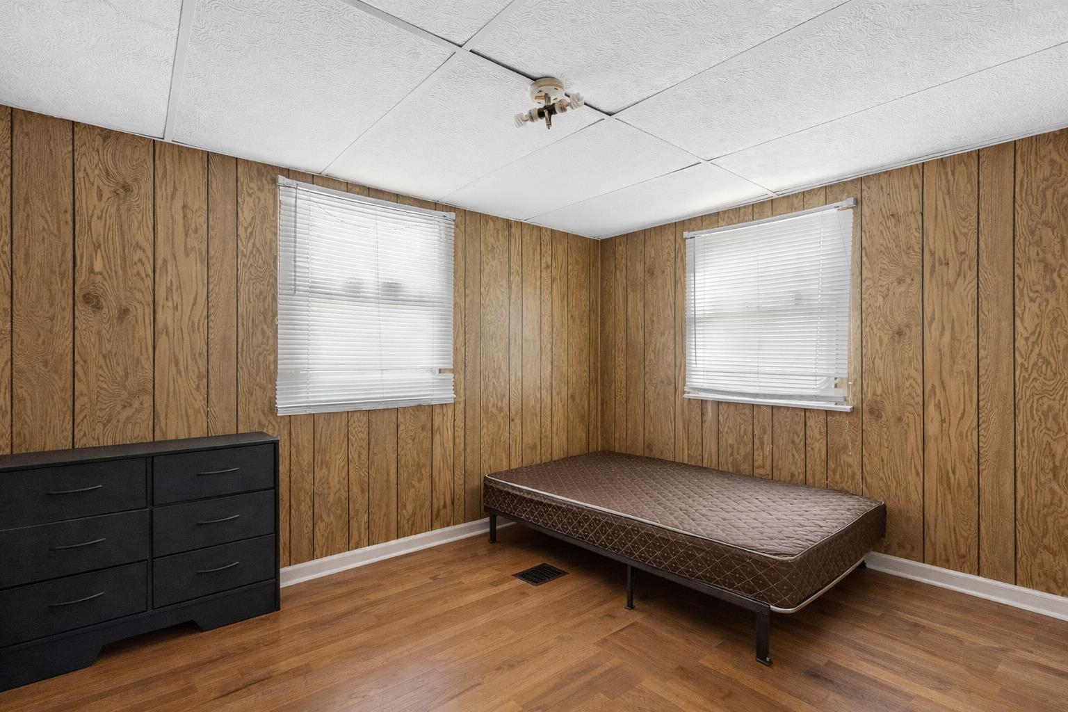 219 Rome Avenue Rockford, IL 61107 - Photo 11 of 24 a bedroom with a bed and a window
