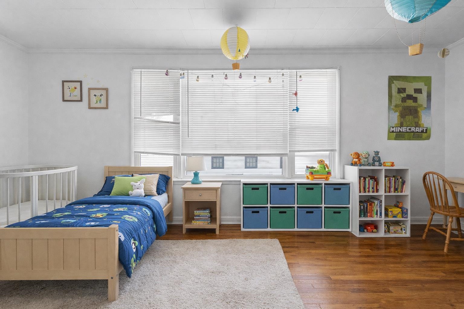 219 Rome Avenue Rockford, IL 61107 - Photo 12 of 24 a bedroom with furniture and window