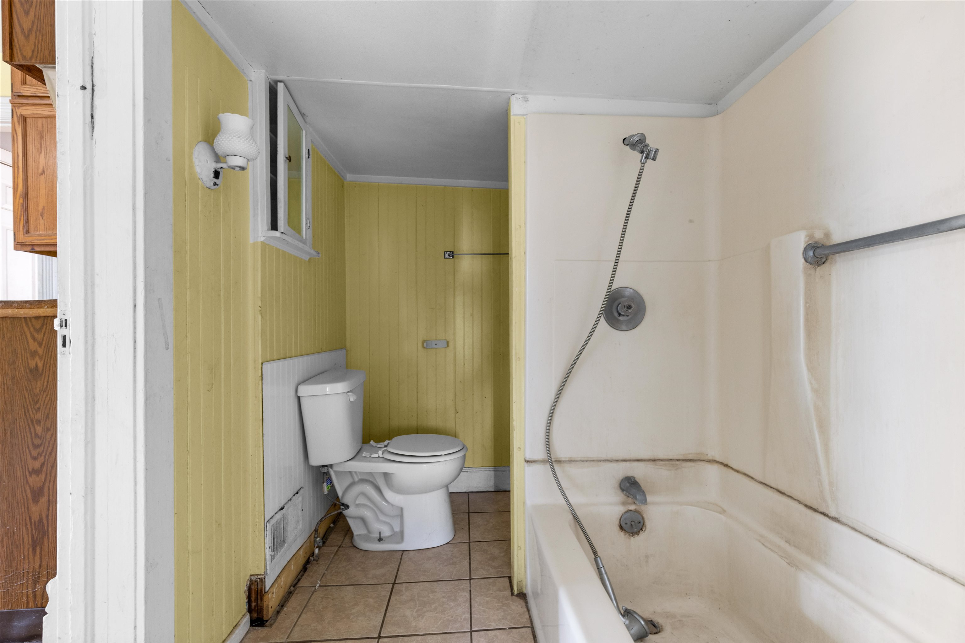 219 Rome Avenue Rockford, IL 61107 - Photo 22 of 24 a bathroom with a toilet and a shower