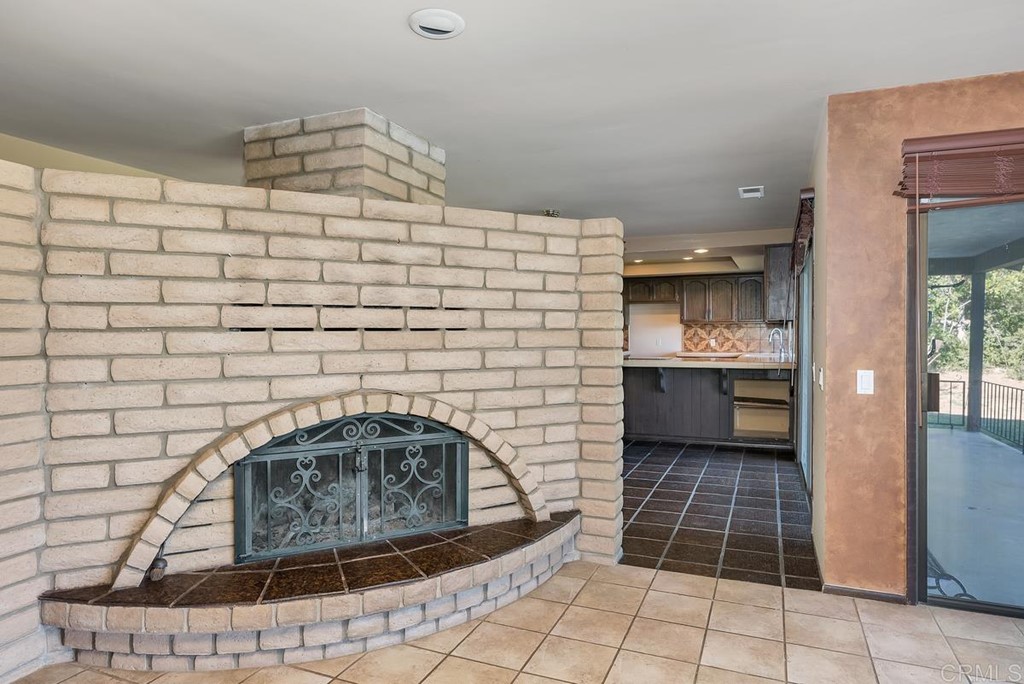 2527 Olive Hill Lane Fallbrook, CA 92028 - Photo 3 of 12 a bathroom with a sink and a stove