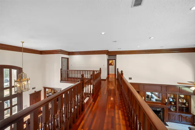 a very nice looking room with wooden floor