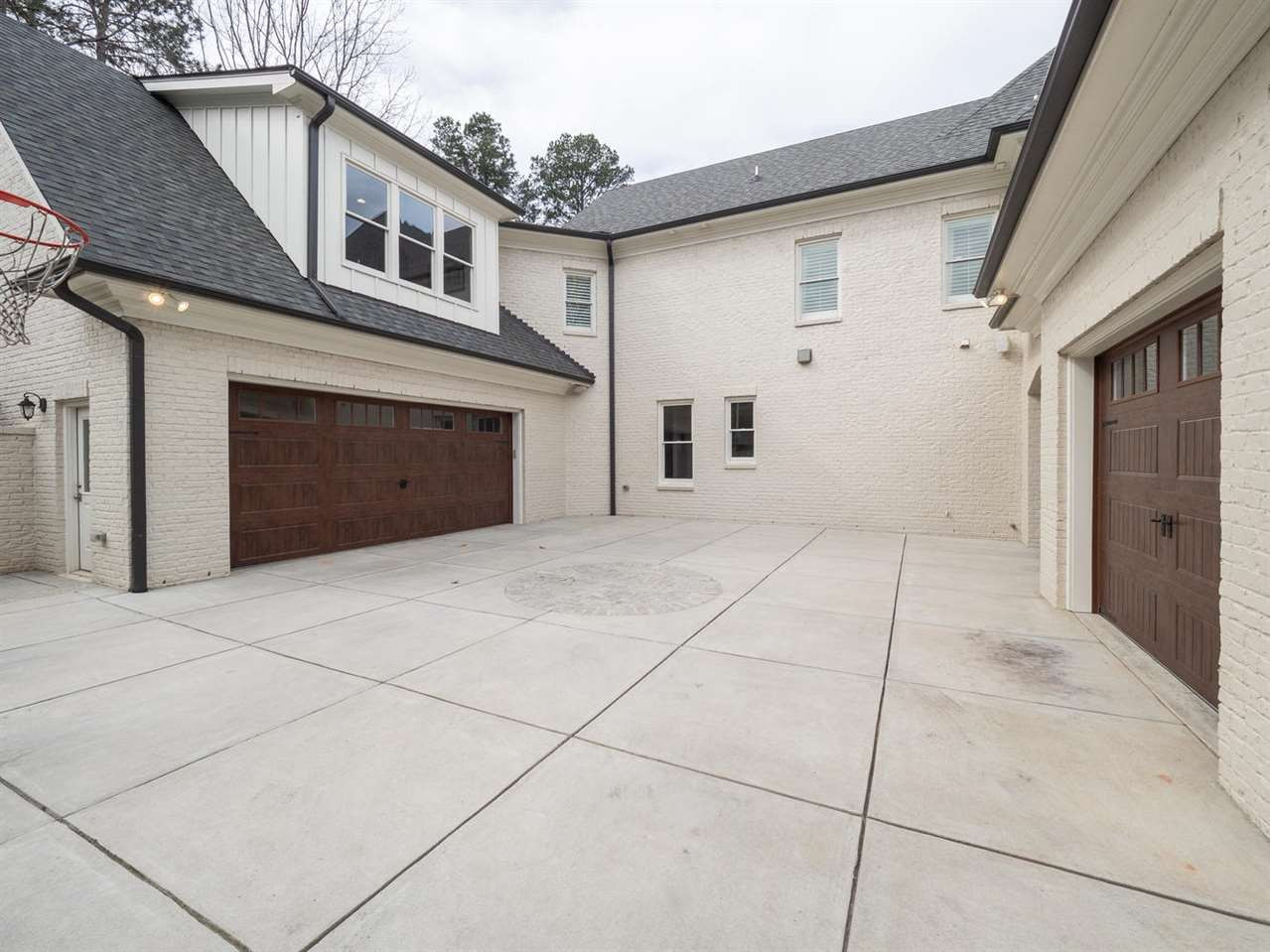 3309 Thomas Road Raleigh, NC 27607 - Photo 14 of 30 Oversized 2-car garage attached and on oversized 1-car garage attached by portico. Courtyard