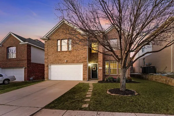 a front view of house with a yard