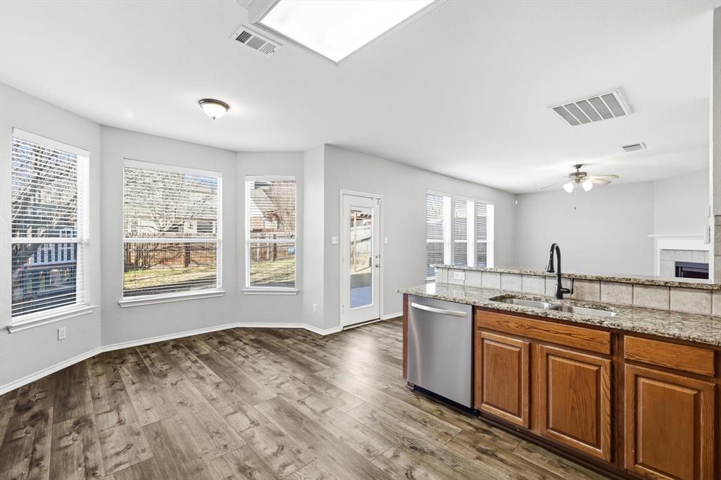 5229 Westheimer Road Fort Worth, TX 76244 - Photo 21 of 39 a kitchen with a sink stove and cabinets