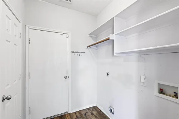 a bathroom with a shower and a sink