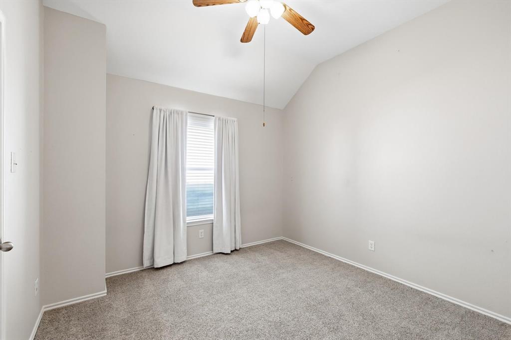 5229 Westheimer Road Fort Worth, TX 76244 - Photo 30 of 39 a view of an empty room with a ceiling fan