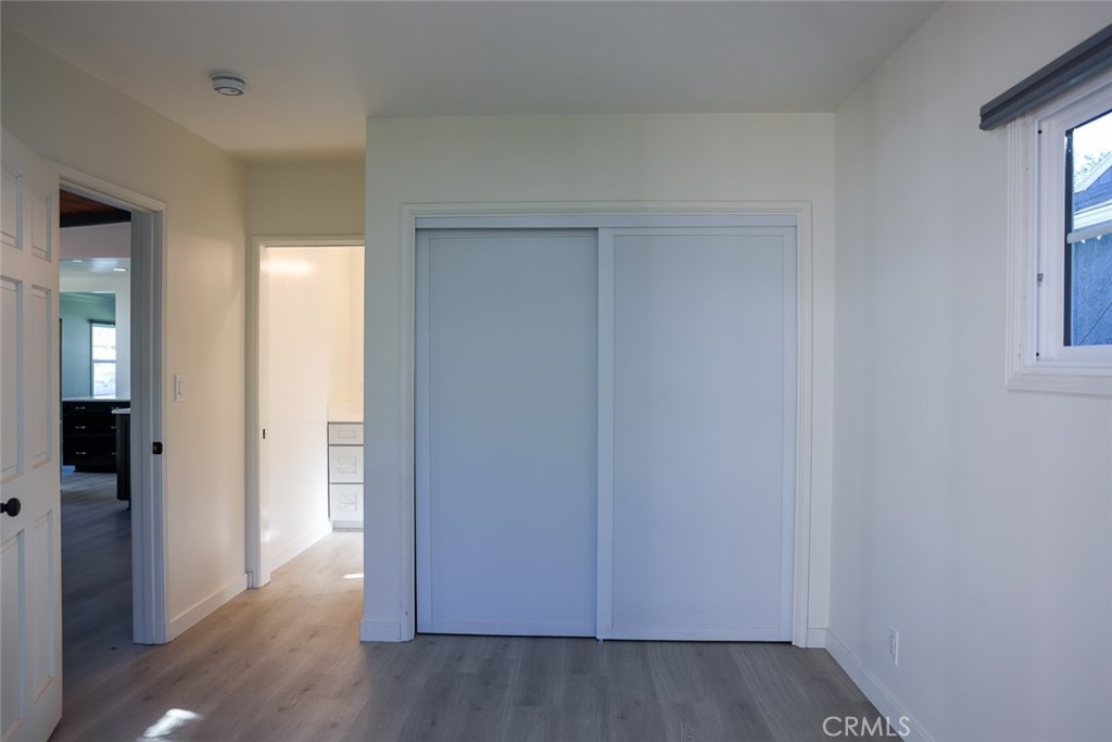 11253 Segrell Way Culver City, CA 90230 - Photo 12 of 17 wooden floor in a bedroom