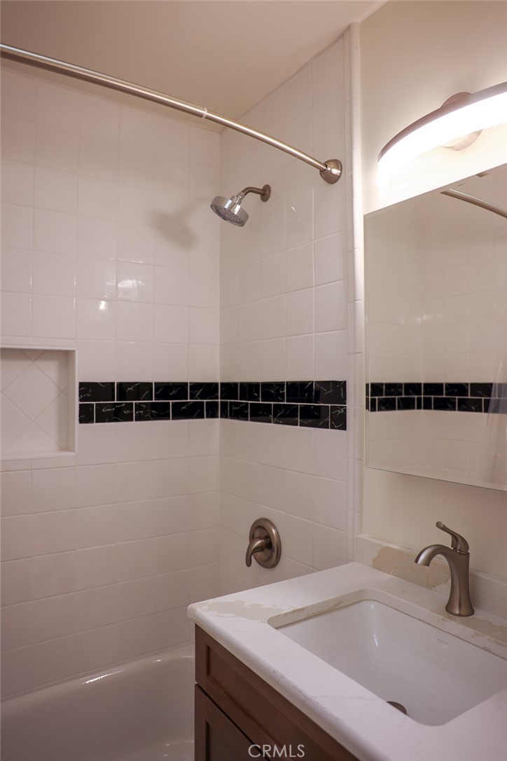 11253 Segrell Way Culver City, CA 90230 - Photo 16 of 17 a bathroom with a sink and a shower