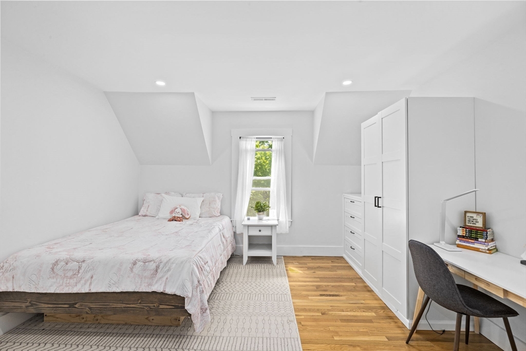 81 Ocean View Road Swampscott, MA 01907 - Photo 27 of 38 a bedroom with a bed and a window