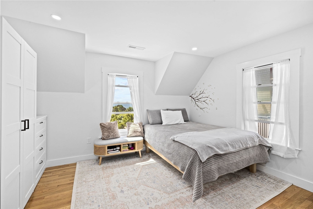81 Ocean View Road Swampscott, MA 01907 - Photo 30 of 38 a bedroom with a bed and a window