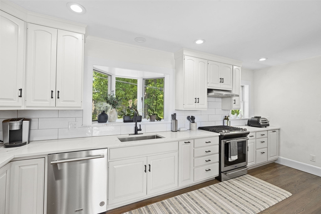 81 Ocean View Road Swampscott, MA 01907 - Photo 4 of 38 a kitchen with stainless steel appliances a sink stove and window