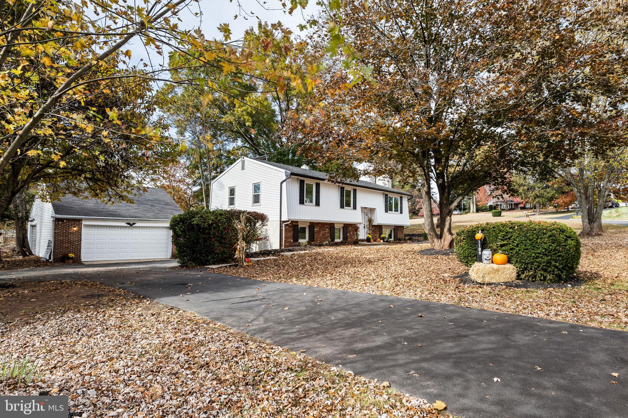 1189 Foxview Road Pottstown, PA 19465 - Photo 2 of 58 a front view of a house with a yard