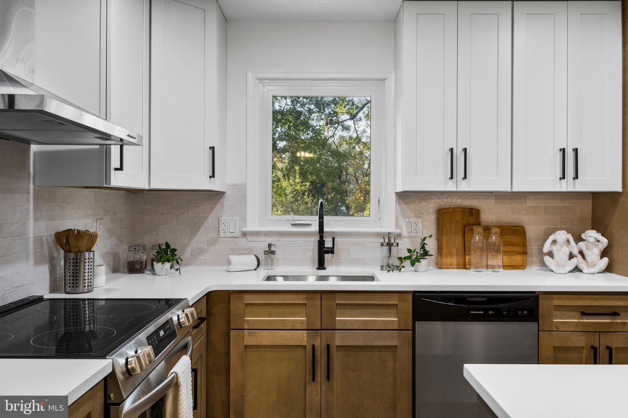 1189 Foxview Road Pottstown, PA 19465 - Photo 22 of 58 a kitchen with stainless steel appliances granite countertop a sink stove and cabinets
