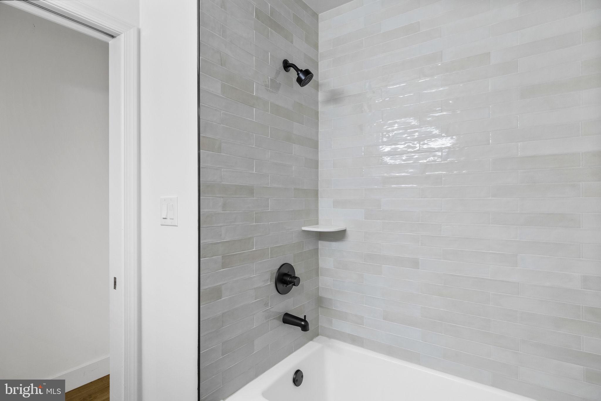 1189 Foxview Road Pottstown, PA 19465 - Photo 25 of 58 a bathroom with a bathtub