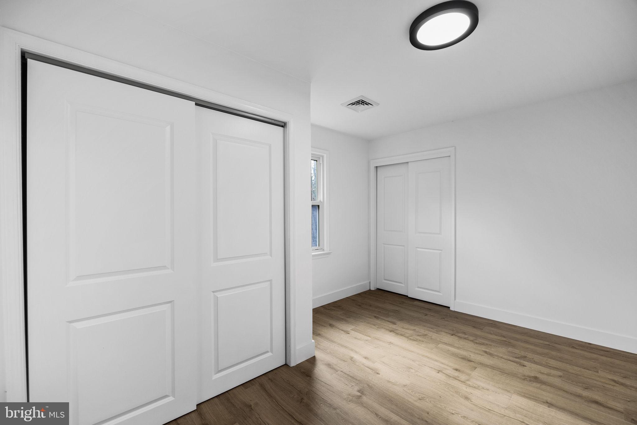 1189 Foxview Road Pottstown, PA 19465 - Photo 28 of 58 a view of empty room with wooden floor