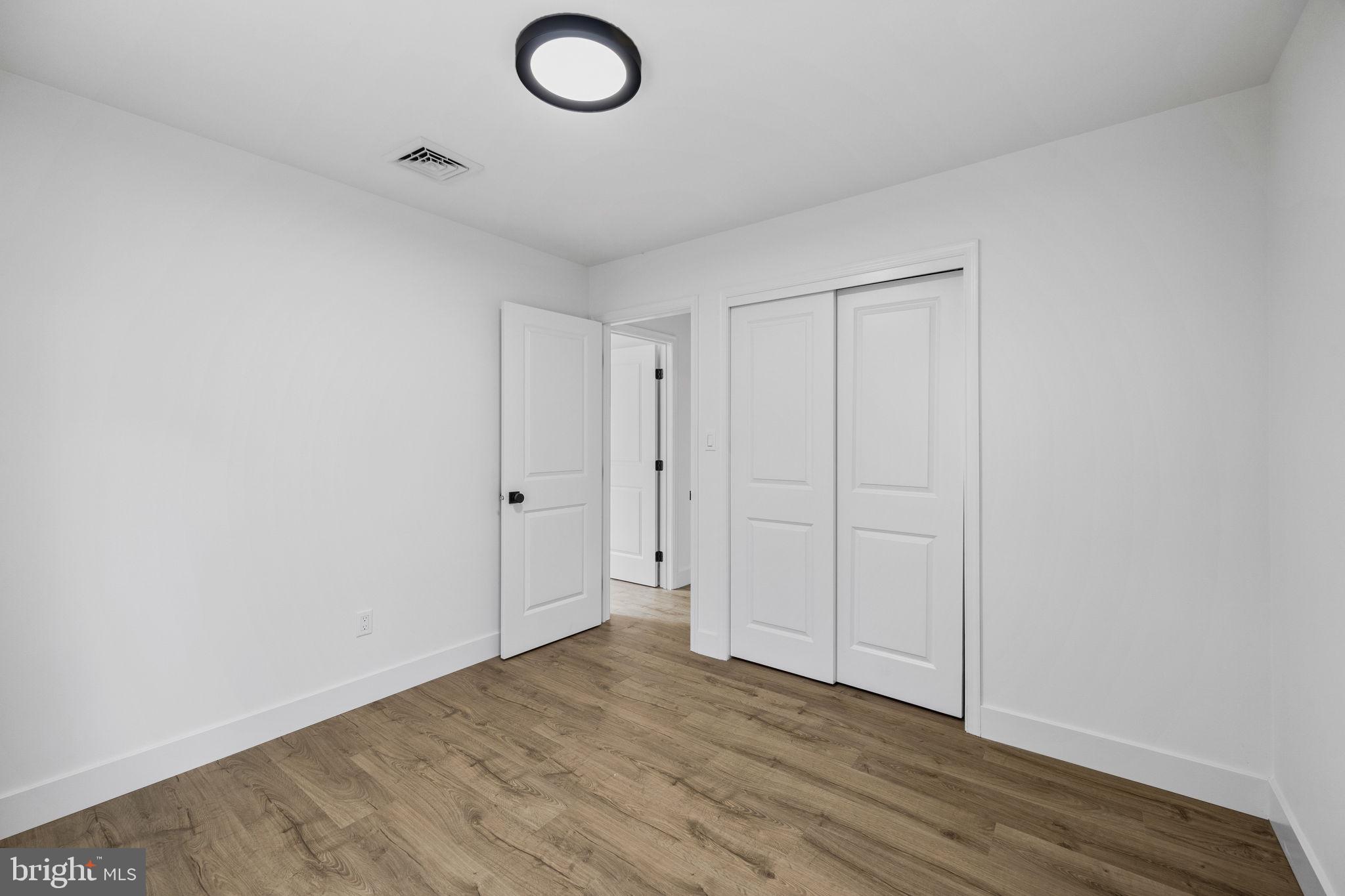 1189 Foxview Road Pottstown, PA 19465 - Photo 31 of 58 a view of an empty room and wooden floor