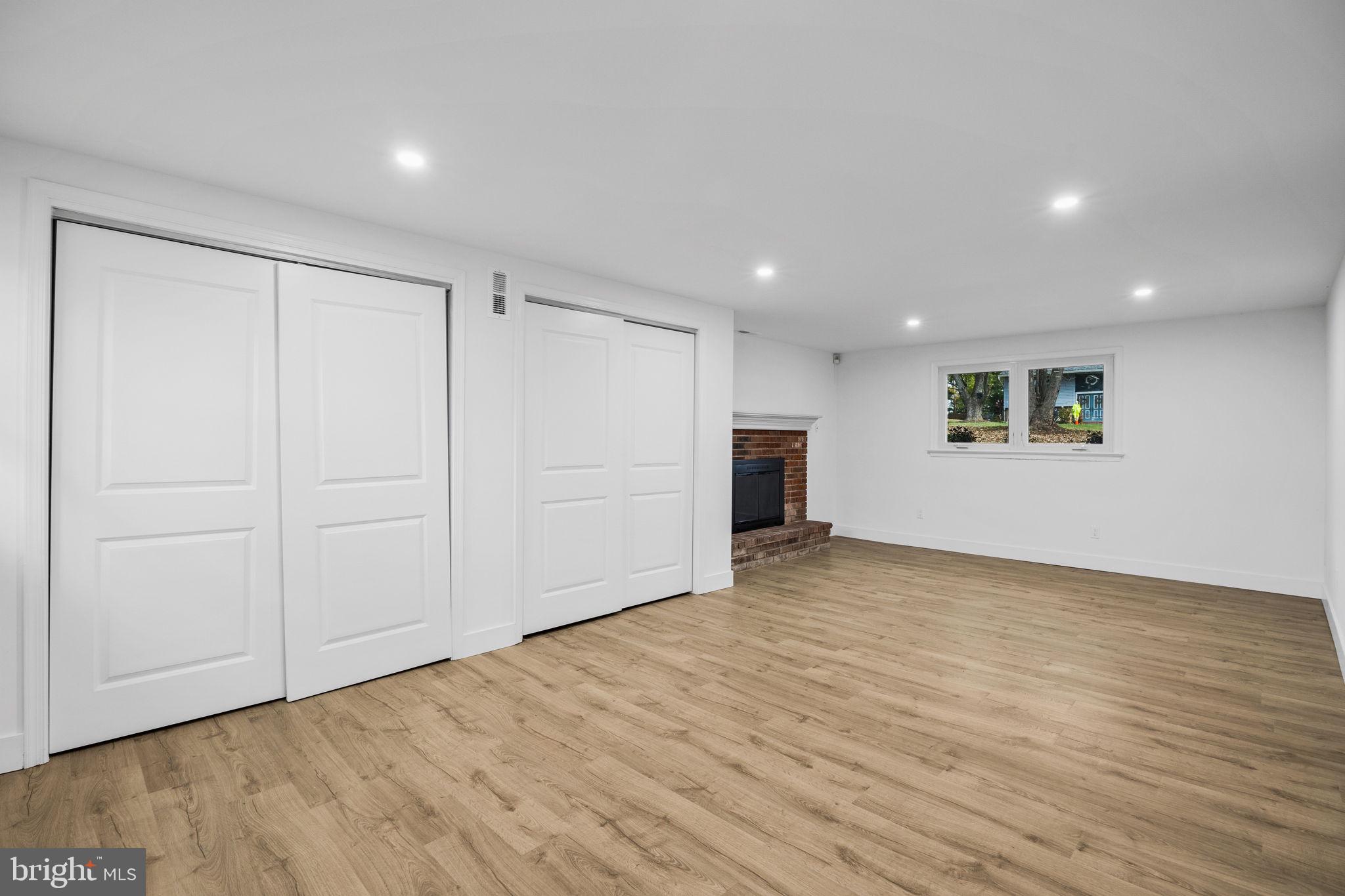 1189 Foxview Road Pottstown, PA 19465 - Photo 40 of 58 a view of an empty room with wooden floor
