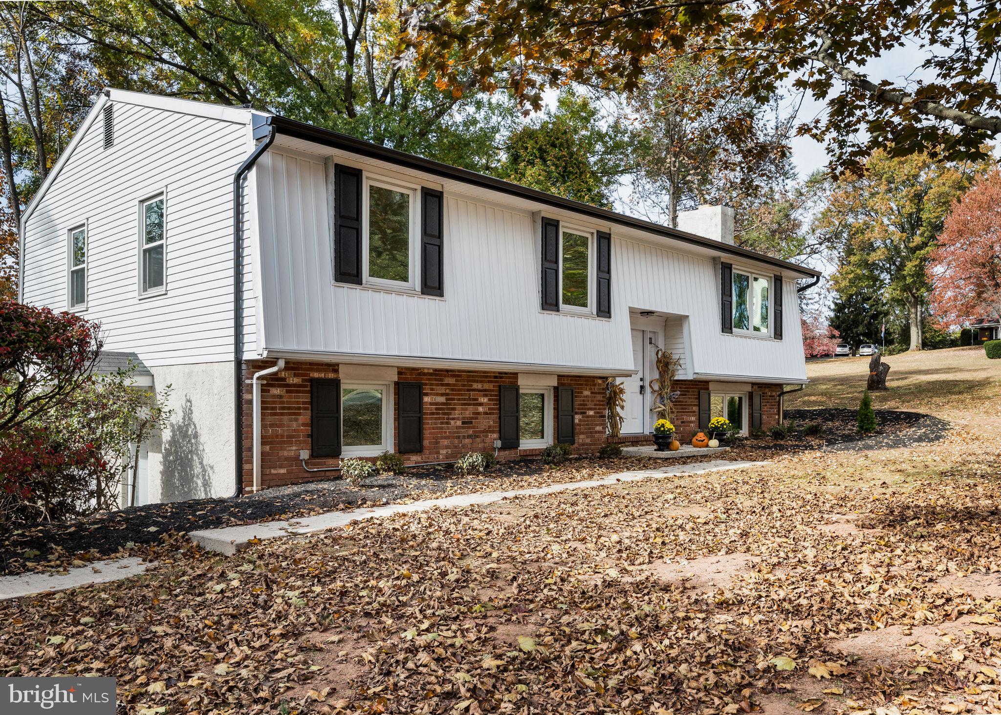 1189 Foxview Road Pottstown, PA 19465 - Photo 4 of 58 a view of a house with a yard