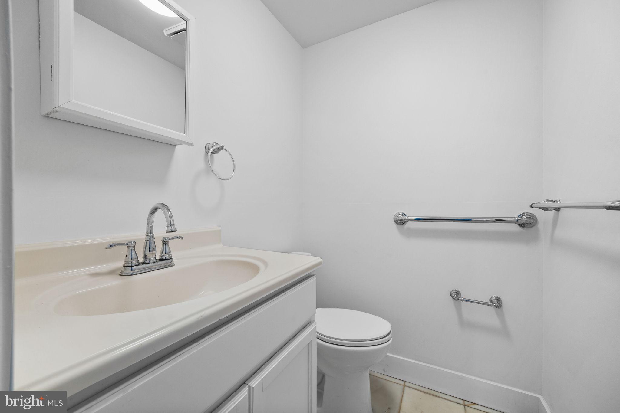 1189 Foxview Road Pottstown, PA 19465 - Photo 42 of 58 a bathroom with a sink and a toilet