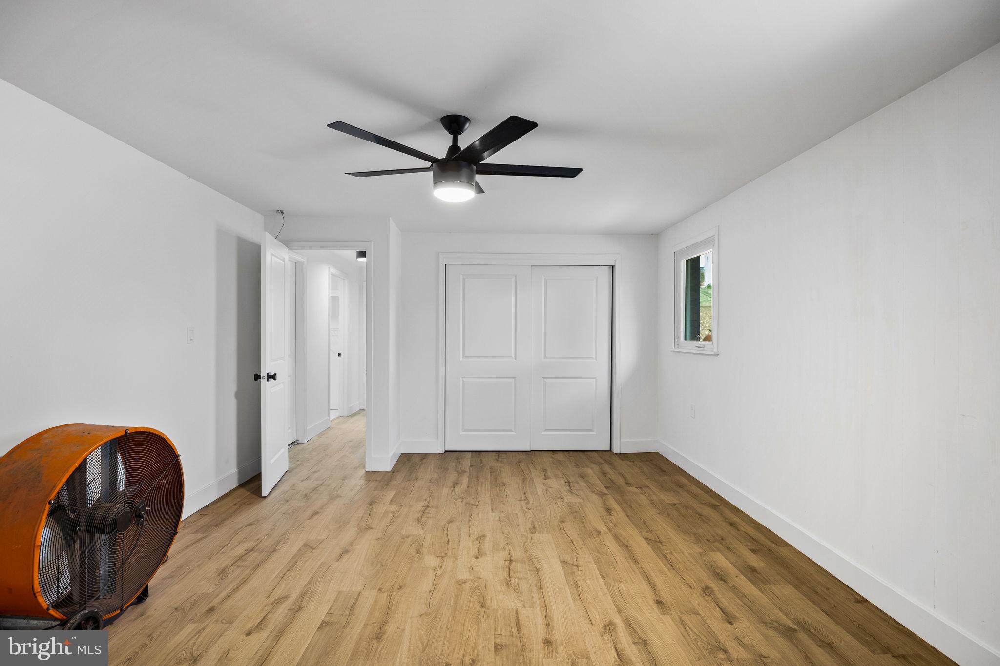 1189 Foxview Road Pottstown, PA 19465 - Photo 46 of 58 a view of empty room with wooden floor
