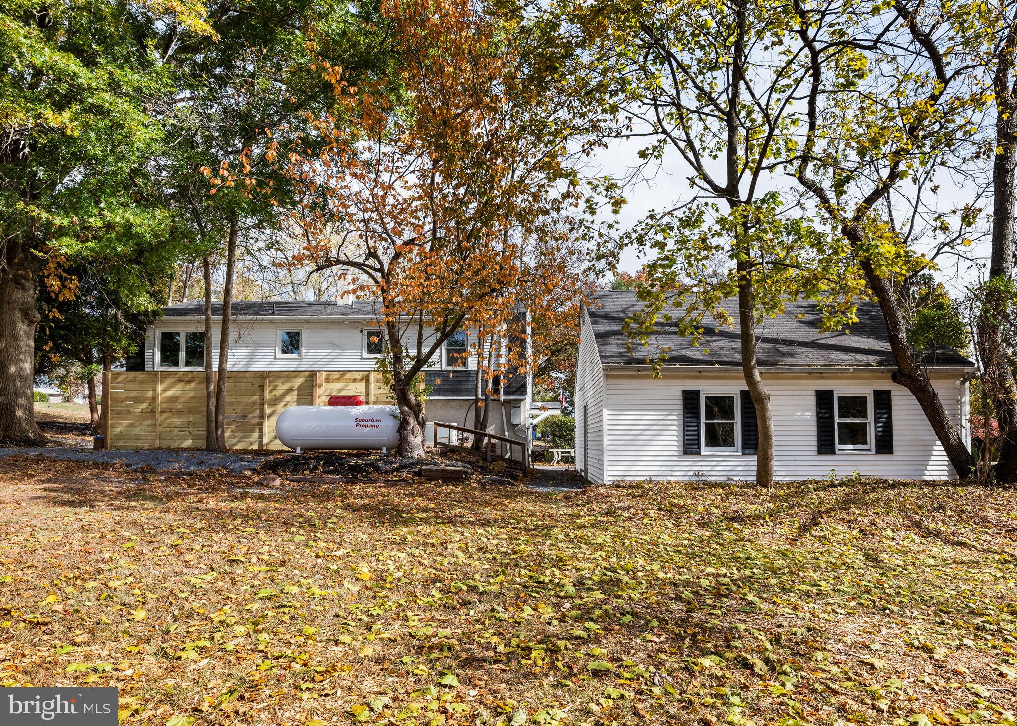 1189 Foxview Road Pottstown, PA 19465 - Photo 53 of 58 a house that has a tree in front of it