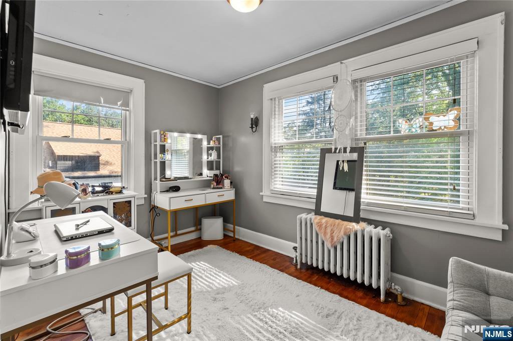 767-773 Ravine Road Plainfield, NJ 07062 - Photo 19 of 38 a room with two beds and a table