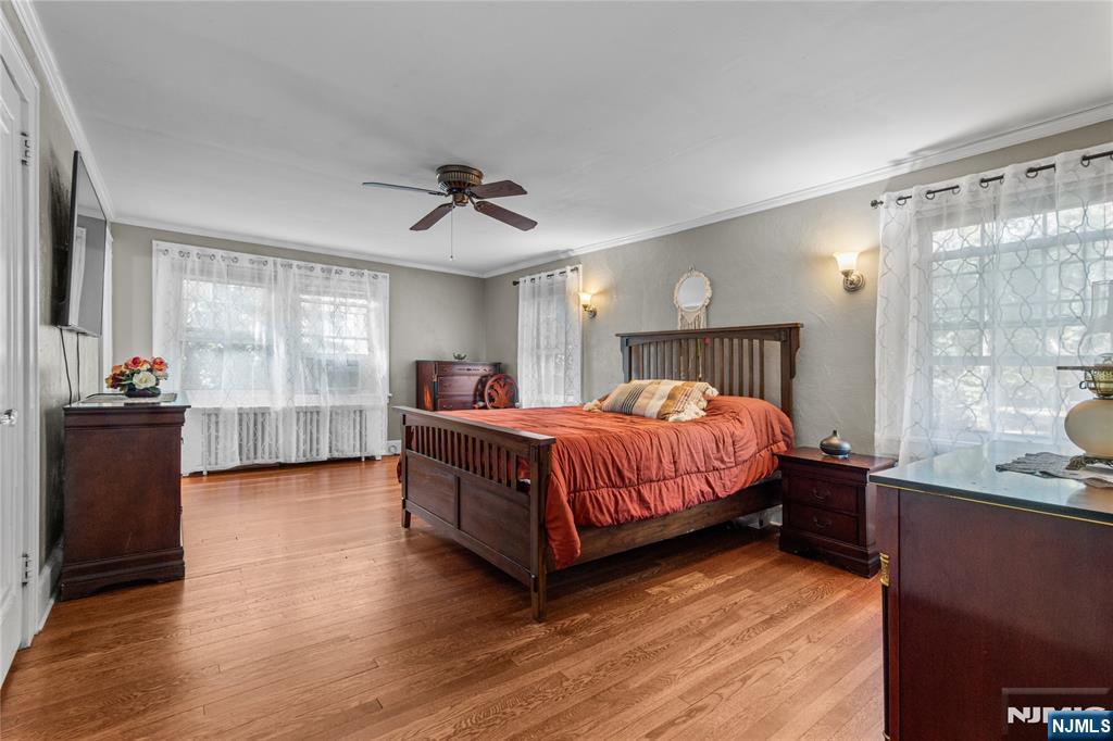 767-773 Ravine Road Plainfield, NJ 07062 - Photo 24 of 38 a bedroom with a bed and wooden floor