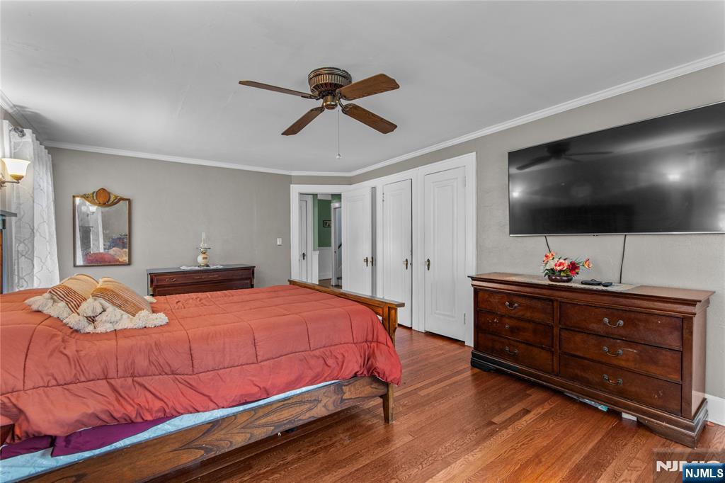 767-773 Ravine Road Plainfield, NJ 07062 - Photo 25 of 38 a bedroom with a bed and a flat screen tv