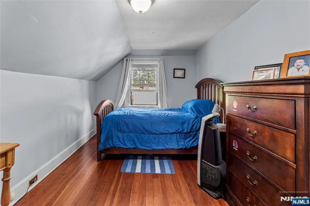 a view of a livingroom with furniture and wooden floor