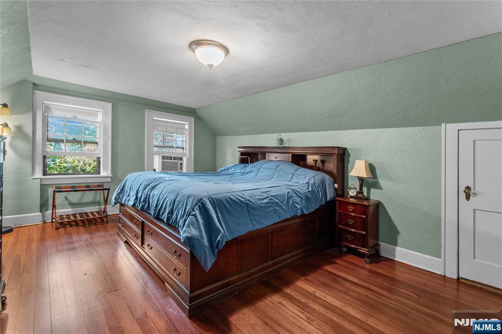 767-773 Ravine Road Plainfield, NJ 07062 - Photo 31 of 38 a bedroom with a bed and a table