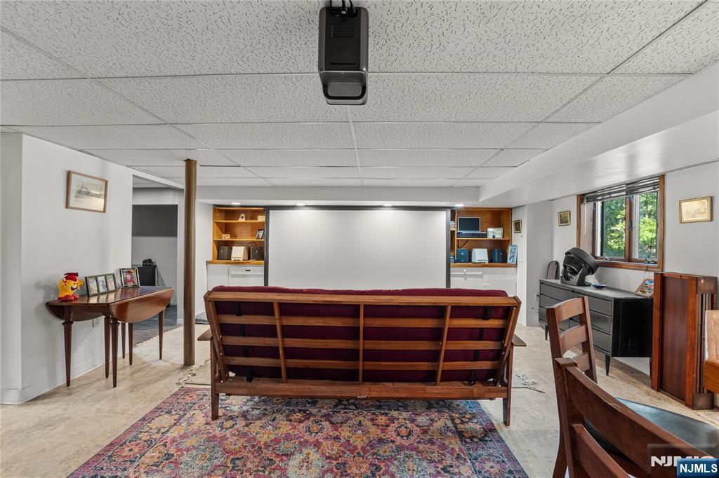 767-773 Ravine Road Plainfield, NJ 07062 - Photo 33 of 38 a room with furniture a air conditioner and a window