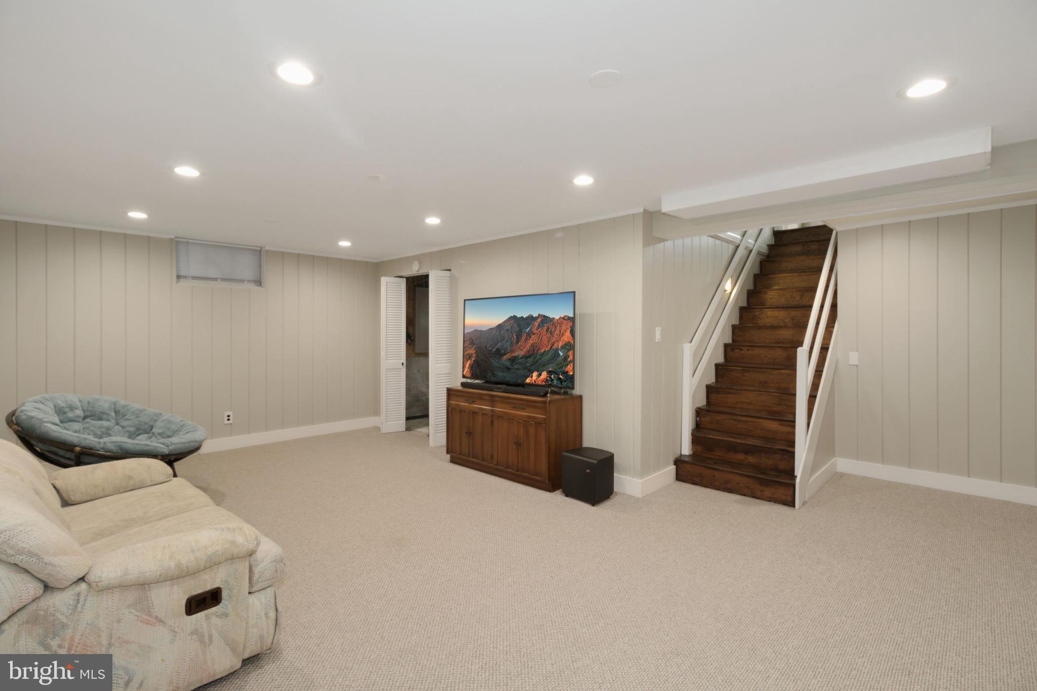 3909 Hawthorne Road Ellicott City, MD 21042 - Photo 34 of 43 Lower Level Recreation Room